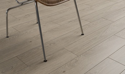 Installed wood-look SPC flooring showing a stable plank surface