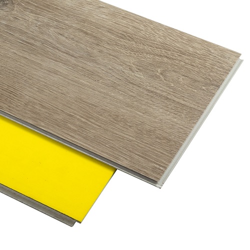 Wood-look SPC flooring plank with attached acoustic backing